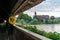 Crossing the historic covered wodden bridge into Germany with Bad Saeckingen and cathedral behind