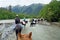 Crossing on the horseback over the river, Caucasus