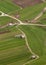 Crossroad with hayrack on field