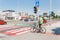 At the crossroads, the cyclist crosses the zebra road, the concept of bicycle safety