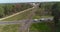 Crossroads of road and railroad, the intersection of rail and road. railway in a beautiful forest area