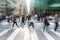 crosswalk becomes motion blur of people moves across the city road, vibrant energy of urban life