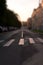 Crosswalk on empty city street closeup. Vertical view. Tilt shift technique