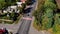 Crosswalk on the road. Top view on pedestrian crossing and highway. Drone shot on street with cars.