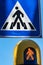 Crosswalk sign and pedestrian traffic light - Trento Italy