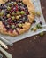 Crostata or galette pie with fresh garden berries