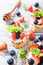 Crostini with grilled baguette, cream cheese and berries