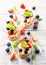 Crostini with grilled baguette, cream cheese and berries