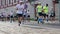 Crowd of athletes running at the marathon blur