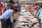 Crowd of buyers at an Asian fish market