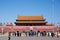 A Crowd Of Chinese Resident Visitors and Tourists Standing Before The Mausoleum of Mao Zedong in Tiananmen Square in Beijing, Chin