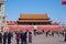 A Crowd Of Chinese Resident Visitors and Tourists Standing Before The Mausoleum of Mao Zedong in Tiananmen Square in Beijing, Chin