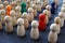 Crowd of colored figures. Recruitment and talent search. Uniqueness and individuality