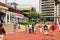 A crowd enjoys a nice day at Inner Harbor