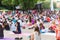 Crowd group girl yoga in the park summer