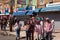 Crowd of joyous people celebrating the Indian Holi festival in Queens, United States.