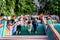 Crowd of local people and tourist climbing the beautiful and colorful stairs to reach limestone Batu Caves