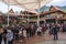 Crowd of passengers are waiting at entrance of Langkawi SkyCab Station during holiday peak season, Langkawi, Malaysia