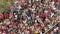 Crowd of people clapping hands while watching entertaining street performance