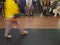 A crowd of people in front of an escalator at a metro station in the city. Blurred people in motion