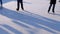 Crowd of People are Skating on Ice Rink in the Sunny Day. Slow Motion