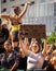 Crowd of people during Vienna Pride Parade with insulting Put it in not Putin sign