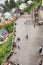 Crowd of people visiting city attractions. a lot of tourists top view.