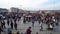 Crowd of people walking on the dockside of Eminonu square, istanbul, Turkey