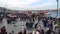 Crowd of people walking on the dockside of Eminonu square, istanbul, Turkey