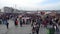 Crowd of people walking on the dockside of Eminonu square, istanbul, Turkey