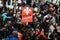 Crowd with Placard, Flags and Signs Walking in the Streets