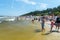 Crowd on seashore of Baltic Sea on Stegna.