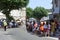 The crowd of supporters in the streets of Anduze spreading the passage of the caravan of the Tour de France