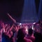 Crowd surf, people at music festival or rock concert, neon lights and energy at live show event. Support, fun and group
