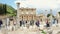 Crowd of tourists on the ruins of the ancient city of Ephesus, near the Celsus library. Shot on steadicam