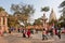 Crowd of tourists walk past holy buddhist Temple