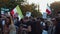 Crowd of various age and gender people marching on large gathering for Iranian women rights. Berlin, Germany