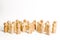 A crowd of wooden figures of people on a white background. Human resource, search for candidates for work. Social survey