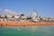 Crowded Brighton Beach with Brighton wheel.