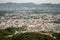 crowded city houses landscape with misty mountain background at morning from flat angle