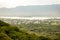 crowded city houses landscape with misty mountain background at morning from flat angle