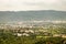 crowded city houses landscape with misty mountain background at morning from flat angle