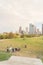 Crowded of diverse people enjoy outdoor with foldable picnic chairs at Eleanor Tinsley park Houston