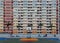 Crowded narrow apartments in the building of Choi Hung public housing estate in Kowloon, Hong Kong, with a basketball stand in the