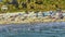 Crowded Nokomis beach in Venice, Florida. Many people enjoying vacations time swimming in ocean water and relaxing on