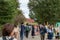 Crowded people going to the Miharashi Hill to see the red kochia bushes