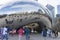 Crowded of people visiting the Cloud Gate sculpture in Millennium Park, Chicago,USA