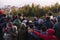 Crowded people are waiting for the first light in the dawn of new year`s day with trees in background at Tiger Hill, Darjeeling.