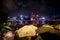 Crowded people waiting National Day Fireworks Display in rain at waterfront of Victoria Harbour of Hong Kong