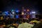 Crowded people waiting National Day Fireworks Display in rain at waterfront of Victoria Harbour of Hong Kong